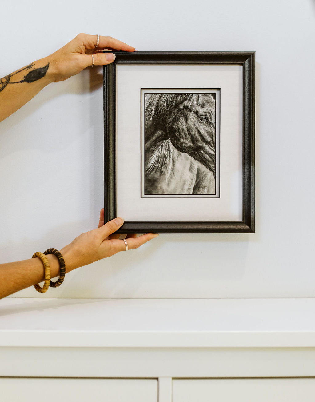 Connection Beyond Words original in frame held by hands