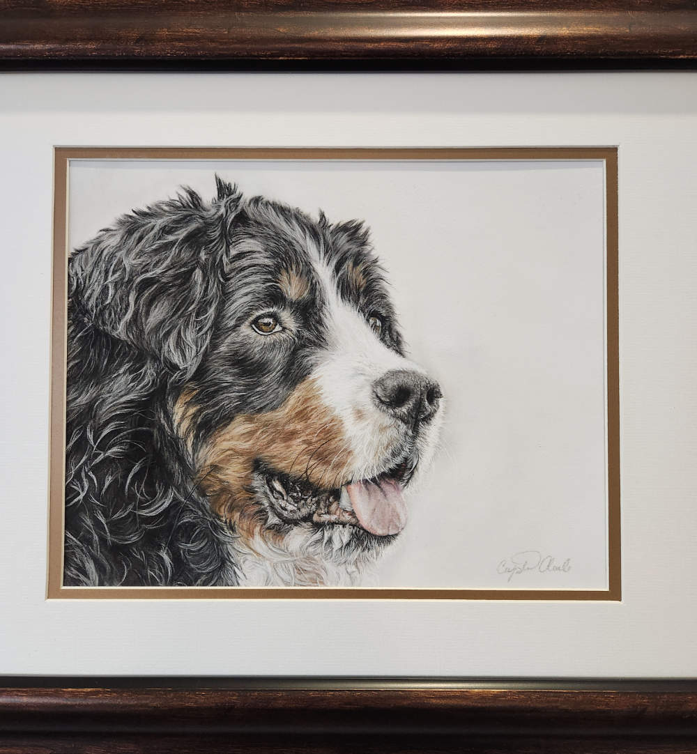 Framed artwork of a dog's portrait on a white background