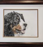 Framed artwork of a dog's portrait on a white background