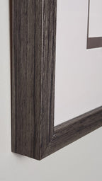 Close-up of a wooden picture frame on a white background