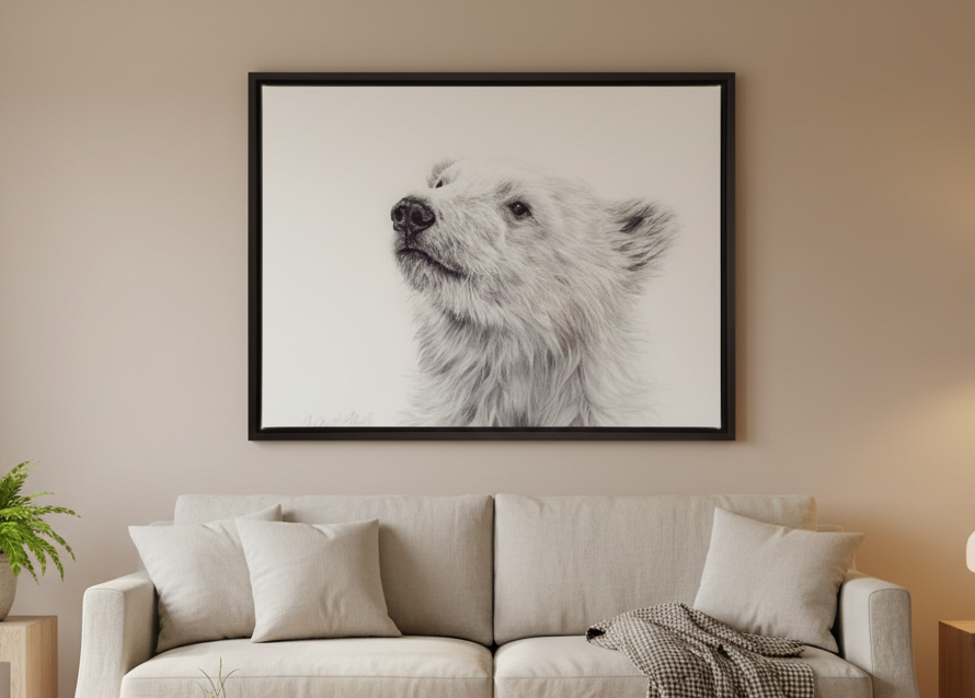 Polar bear canvas print above a couch in a room