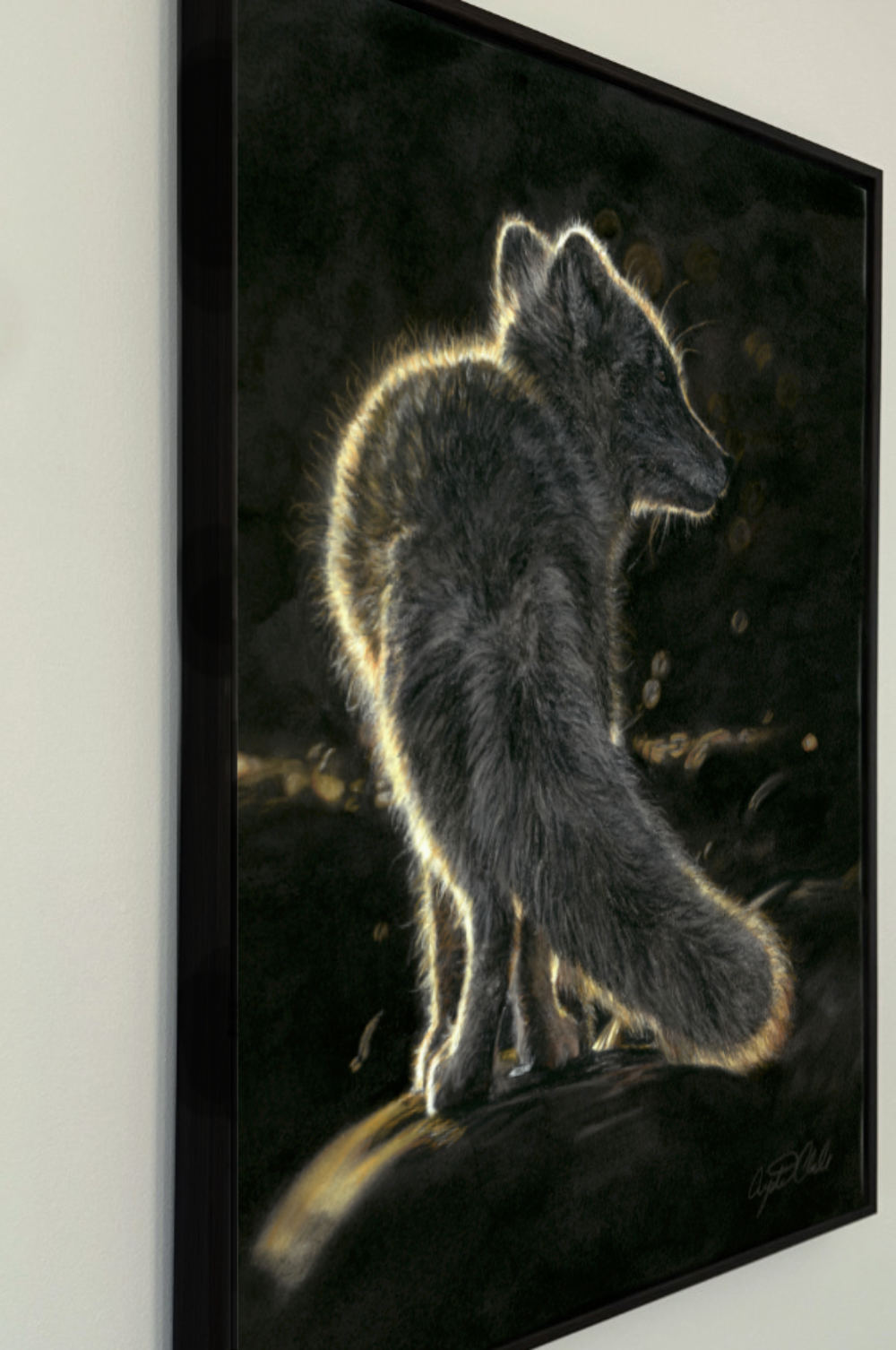 A framed vertical art print depicting a fox standing in profile against a dark, glowing background, mounted on a light wall drawn by Crystal Clarke
