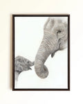 A framed canvas print showing a large elephant and a baby elephant touching trunks, mounted against a light beige wall. Drawing by Crystal Clarke
