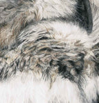 Close-up of a textured pastel artwork of an owl